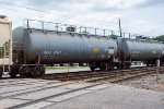 Two interesting tank cars roll east in a manifest